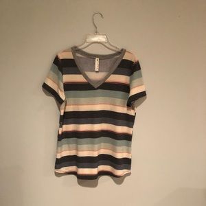 striped T-shirt and blues and greens. The brand is vanilla bay, size medium.
